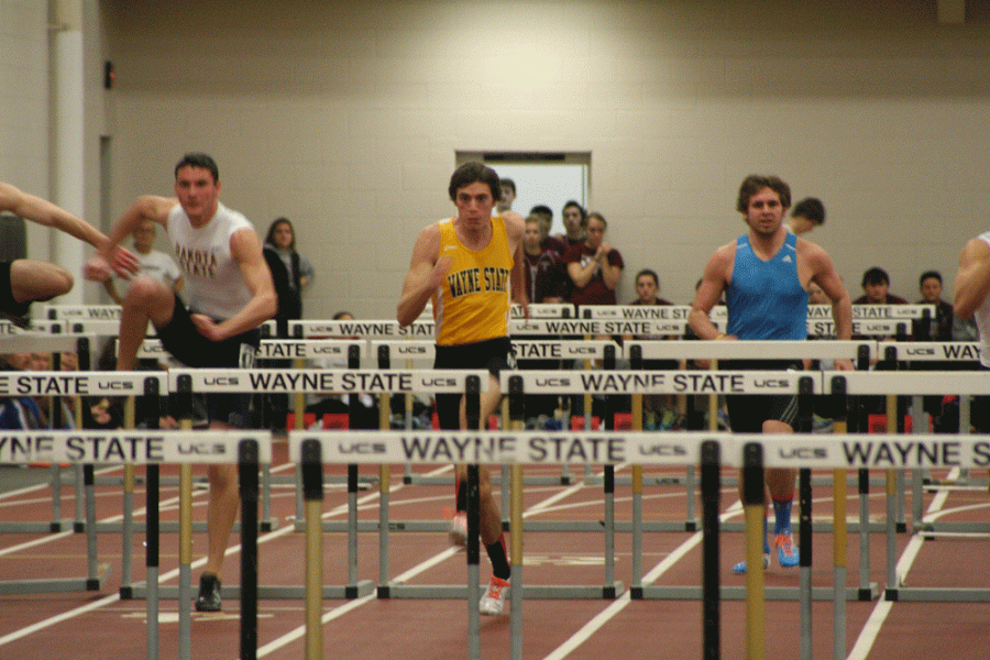 Corbin Marksmeier battles other area schools in the hurdles in last weekend’s Wildcat Open held in the Rec Center.