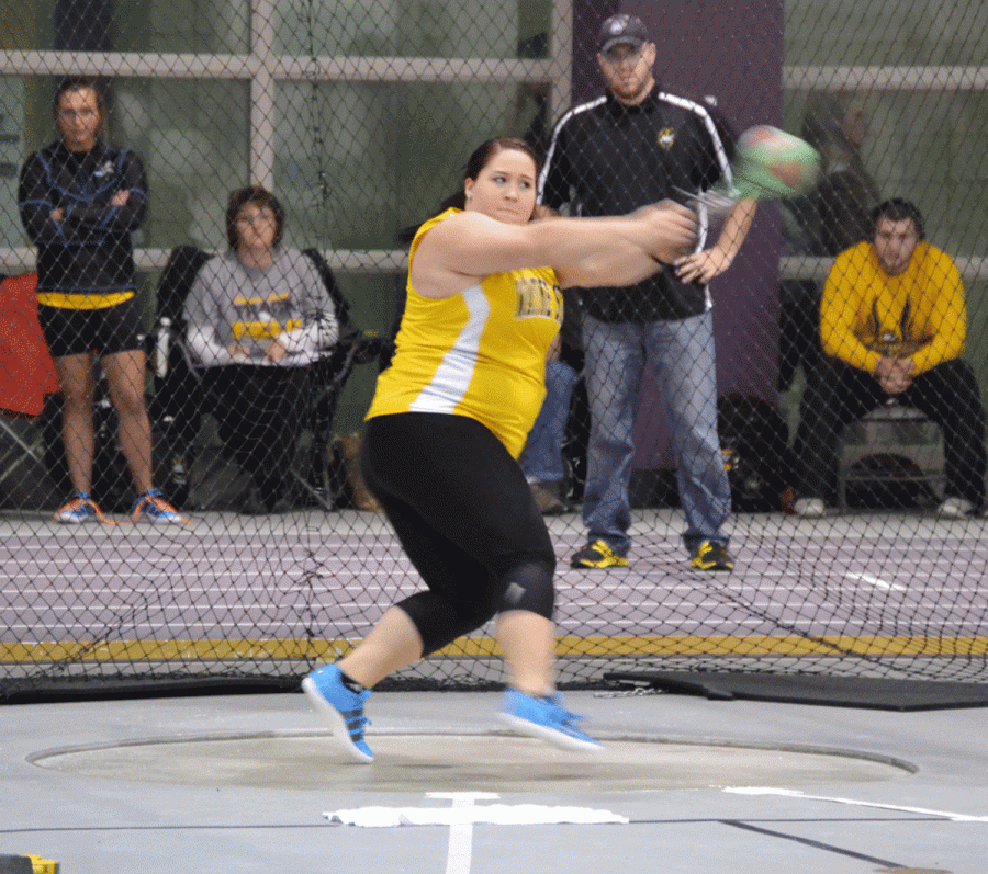 Carly Fehringer goes through the motion and collected a first place in the weight throw with a 63’ 8”.
