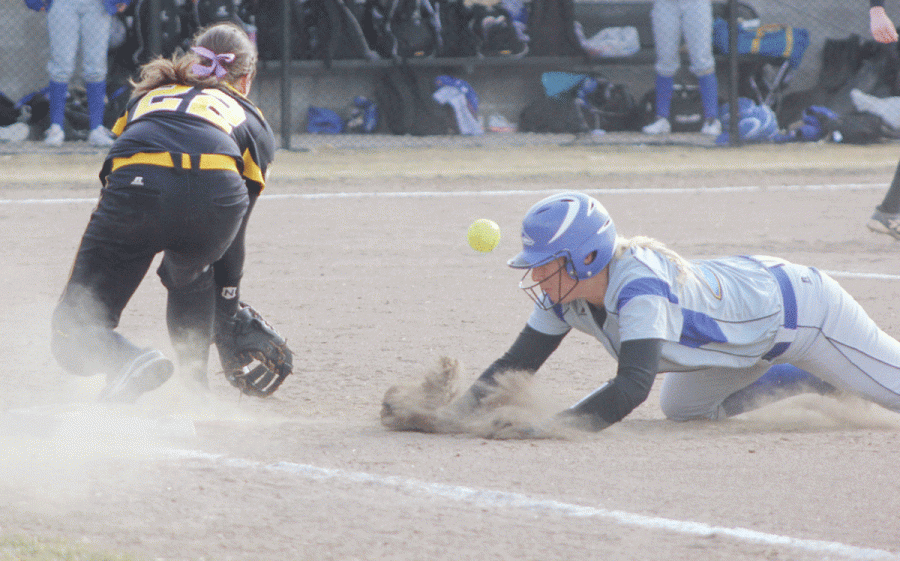 Melanie Alyea stands at first and tries to catch a Loper baserunner off guard in last Wednesday’s doubleheader with UNK.
