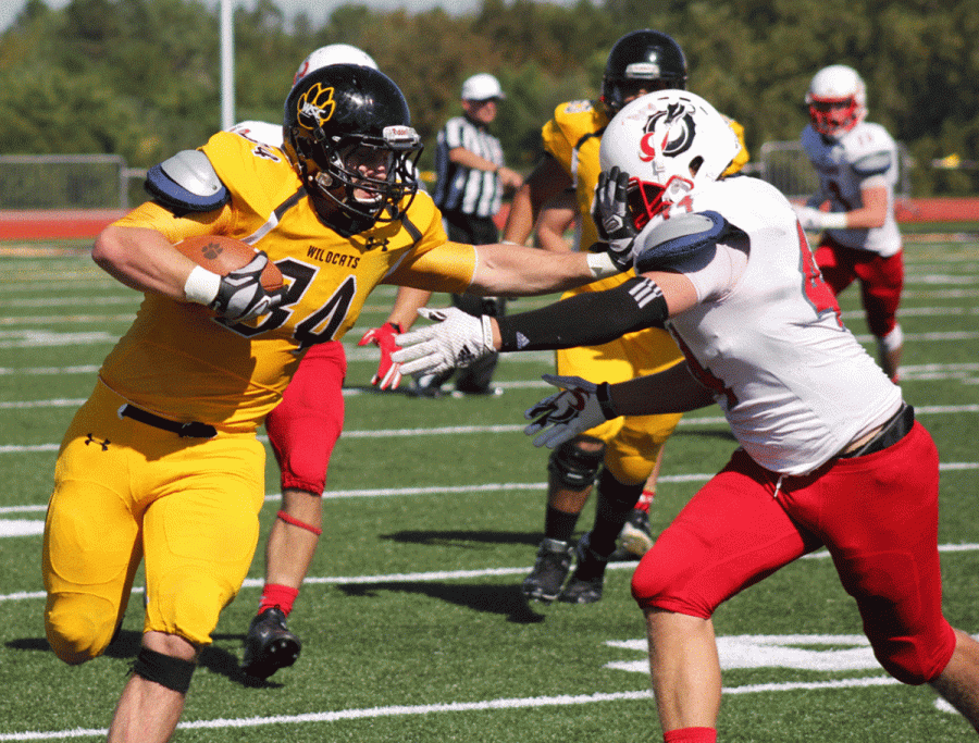 Ryan Ludlow gives an MSU Moorhead defender a stiff arm during last Saturday’s 40-36 loss to the Dragons.
