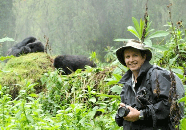 Jacobs is shown here with a gorilla in Rwanda.