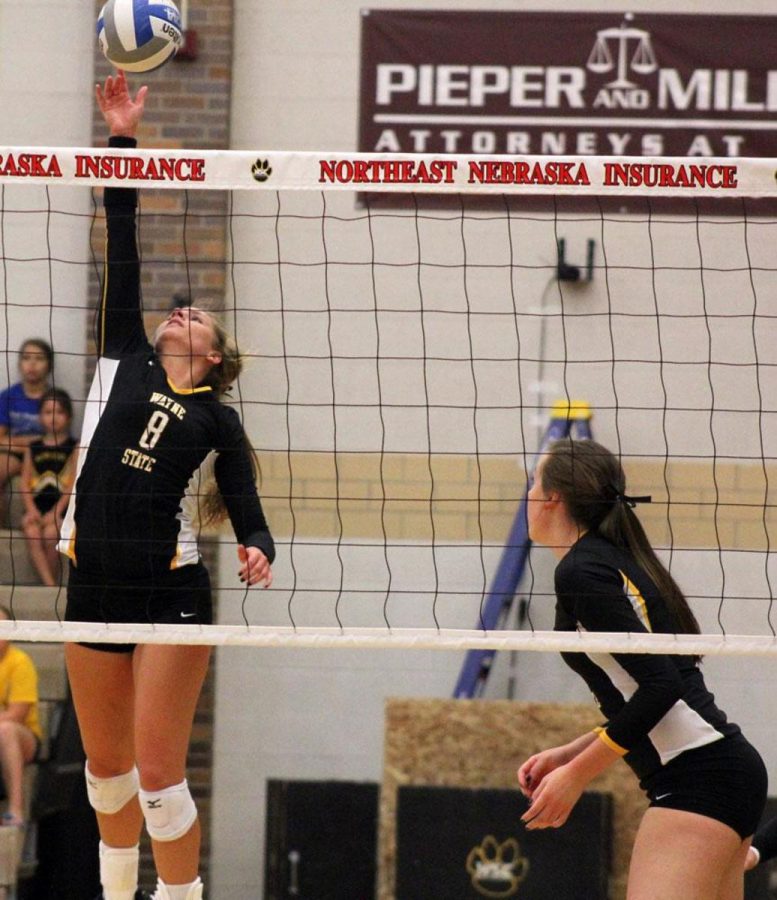 Katie Hughes collects a kill in a match earlier in the year. She led the team last night with 15 kills.