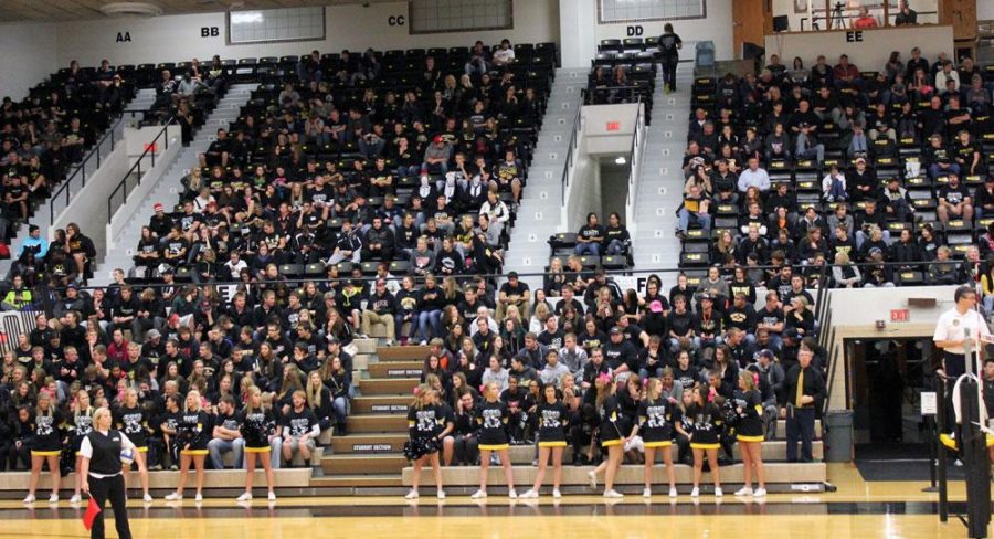 A crowd of 1,216 Wildcat volleyball fans takes in the annual Blackout/Pack The House night against Augustana. It was the fourth-largest crowd in history for Wayne State.
