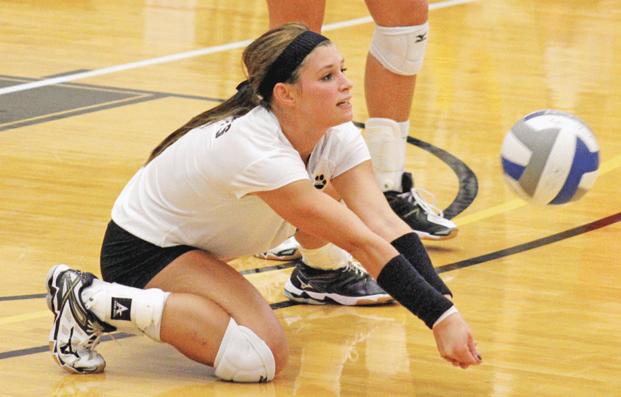 Courtney VanGroningen digs the ball in a game last Saturday against second-ranked Minnesota Duluth. VanGroningen totaled ten kills in the loss to Minnesota Duluth. The Wildcats suffered their second loss of the season to the Bulldogs.