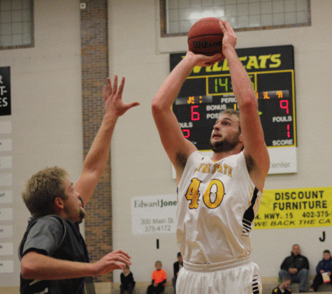 Patrick Kurth takes a shot from the elbow in their win over Iowa Wesleyan. 