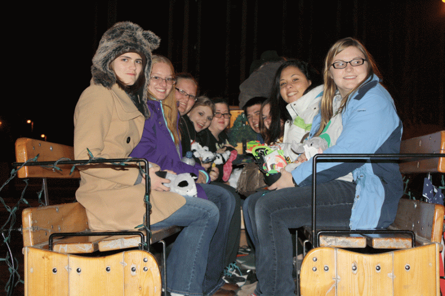 A group of WSC students are dressed warmly for their sleigh
ride around campus. The Winter Wonderland event featured
sleigh rides, a build-a-bear station and other fun activities.