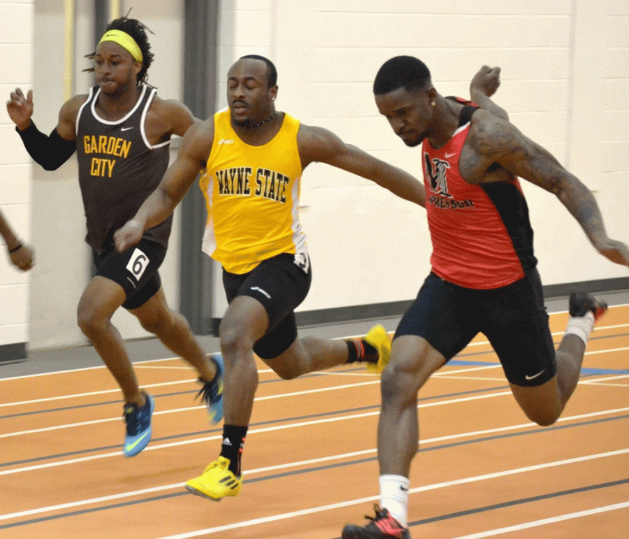 Braxton Adams sprints down to the finish in the 60 meter run, ultimately taking second in the event.