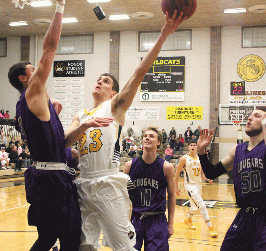 Joel Heesch makes a play on the basket in a game earlier in the season. Wayne State travels to MSU Moorhead for the first round of the NSIC Conference Tournament.