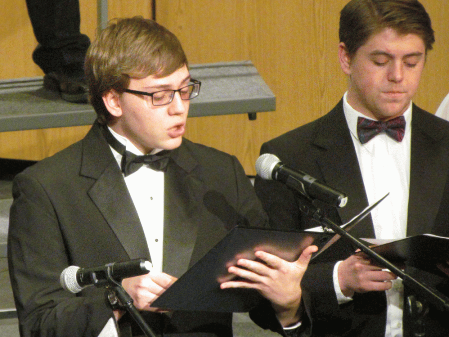 Andrew Korenak singing in ecclesiis by Giovanni Gabrieli at the WSC Winter Choir Concert in Ramsey Theater.
