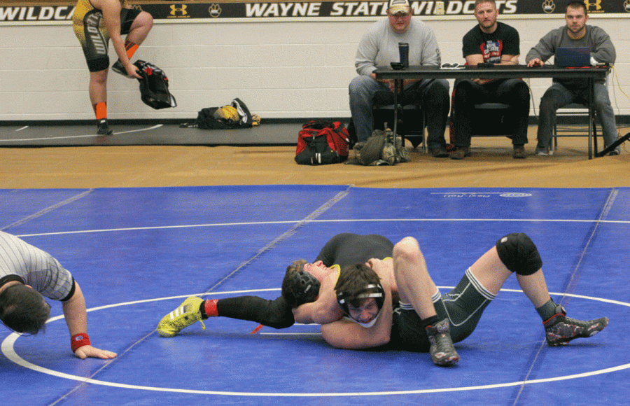 Casey Glassgow perfects his pin on an opponent during Saturday’s National Collegiate Wrestling
Association Great Plains Conference National Qualifying Tournament in Rice Auditorium.