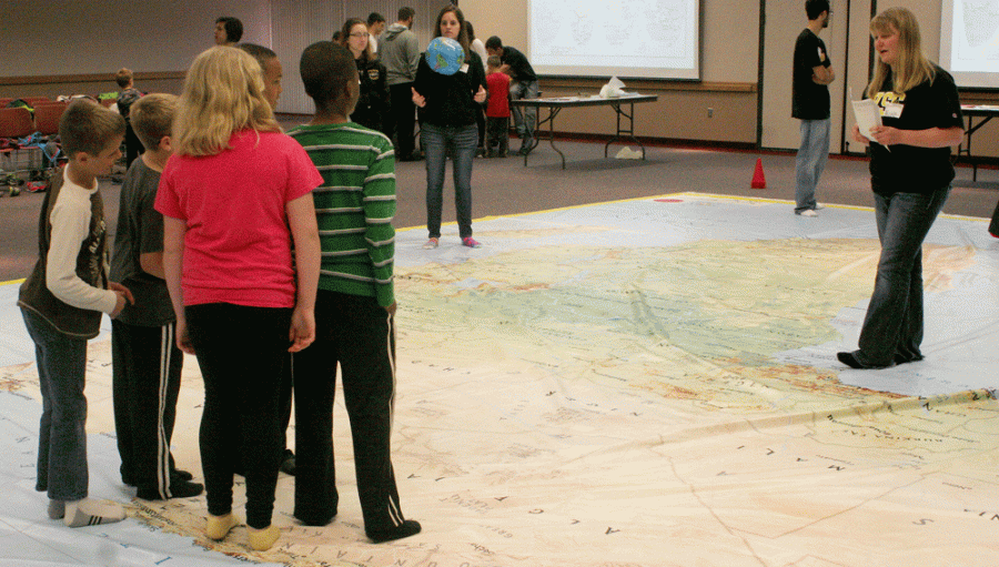 Students from Wayne Elementary play a geographic version of “Simon Says.”