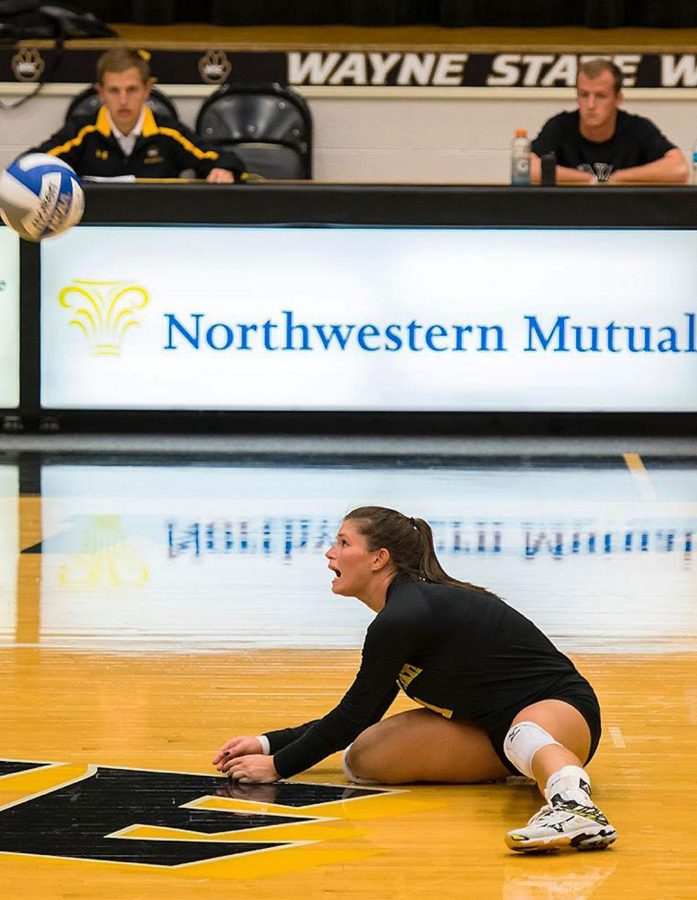 Courtney VanGroningen executes a dig to help defend against a Mankato point on Saturday night’s contest.