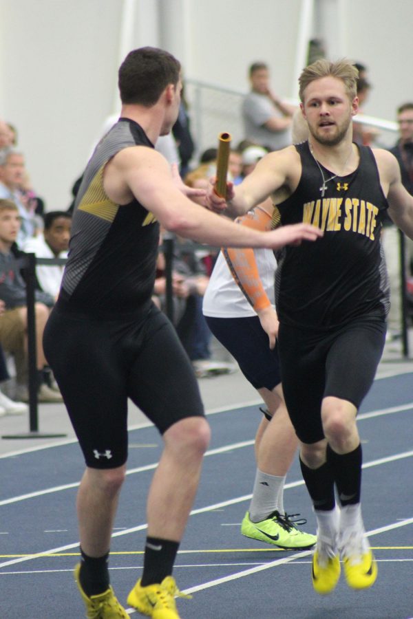 Trenton Zink hands off the baton to Nate Lechtenberg during the 4x4 race in last weeks Concordia Invite in Seward.