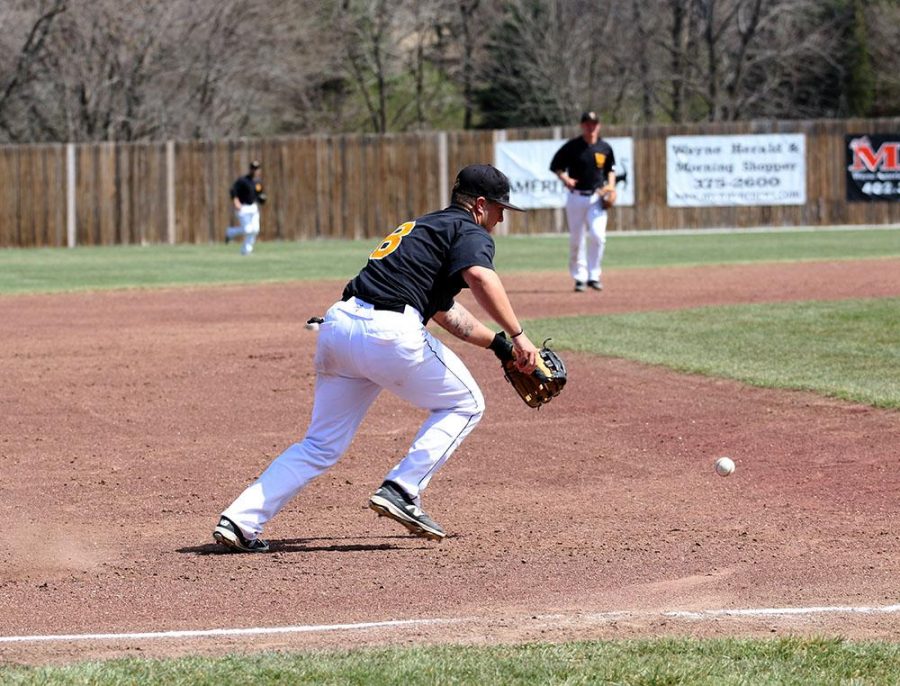  Cody Jenkins fields a ground ball against Winona State.