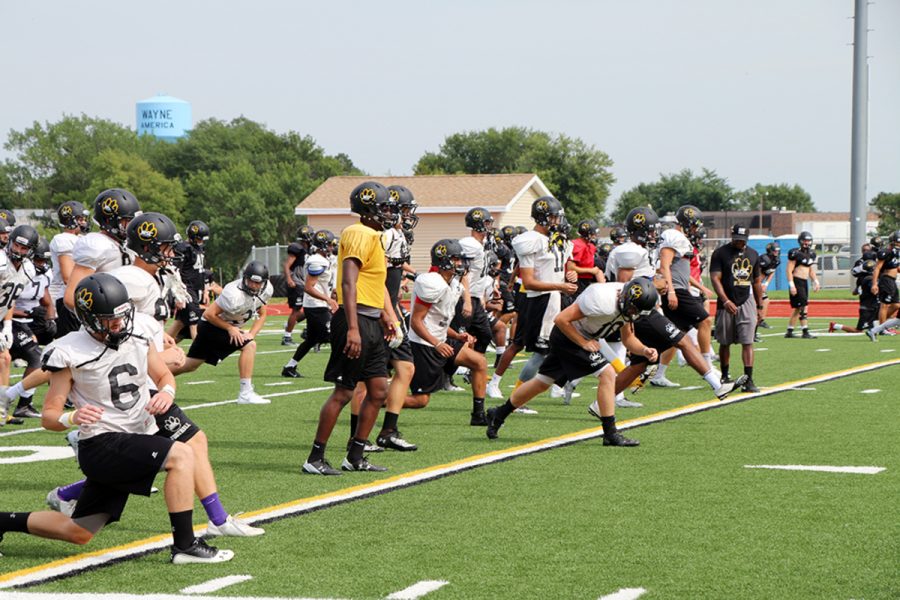 The WSC Football squad warming up on the Bob Cunningham Memorial Field before Monday’s practice. The players are preparing for their opening home game against Minot State on September 10. 