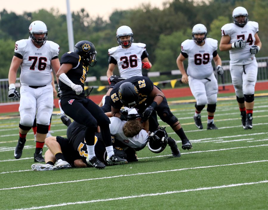 Despite wind and thunder storms, WSC football held off the St. Cloud State Huskies 23-22 on Saturday to record the first win of the season for the Wildcats.