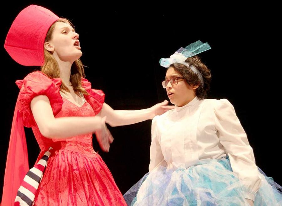 Junior Anna Kruger created all the costumes for the spring show “Alice’s Adventures in Wonderland.” The Red Queen (Hope Pedersen) tells Alice (Dulce Torres) that she could be a queen.
