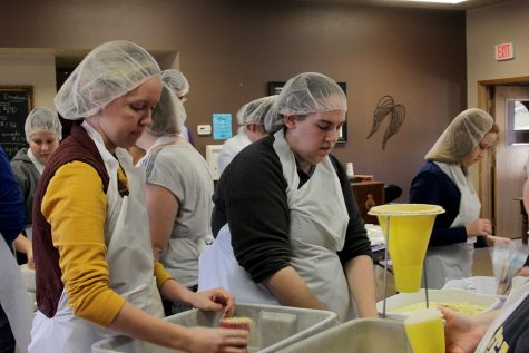 More than 250 students helped package meals for needy children world-wide. They packaged 48,000 meals, 6,000 more than the goal. The meals each had vegetables, chicken flavoring, soy flakes and rice.