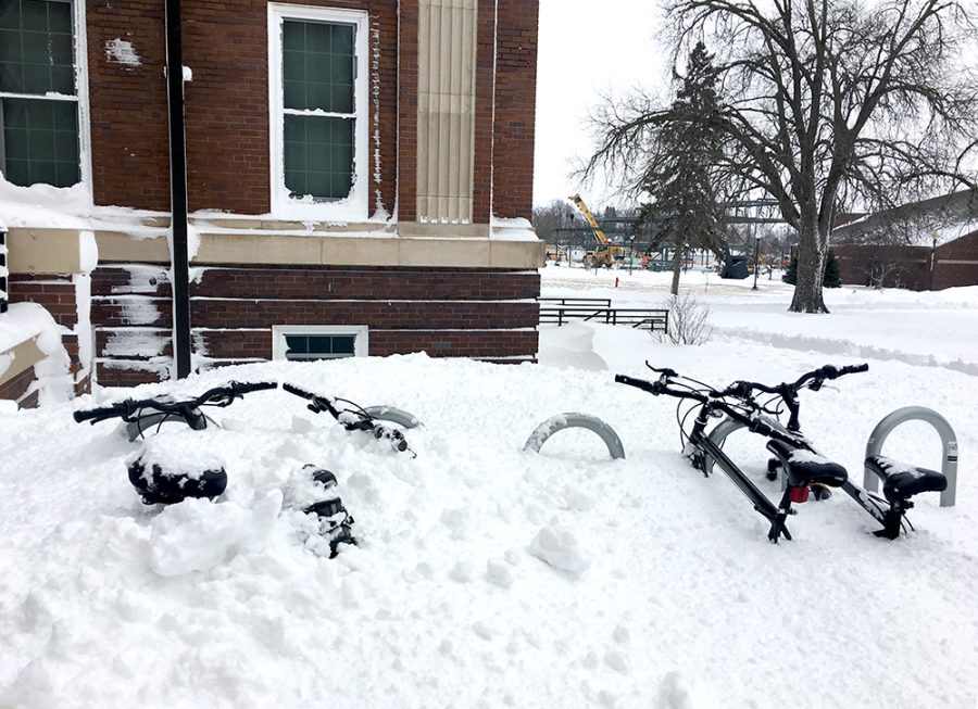 Snow piled high covering bikes and statues across campus. It took WSC several days to clear snow
off campus. Wayne received over 13 inches of snow in the snow storm on Jan. 22. 