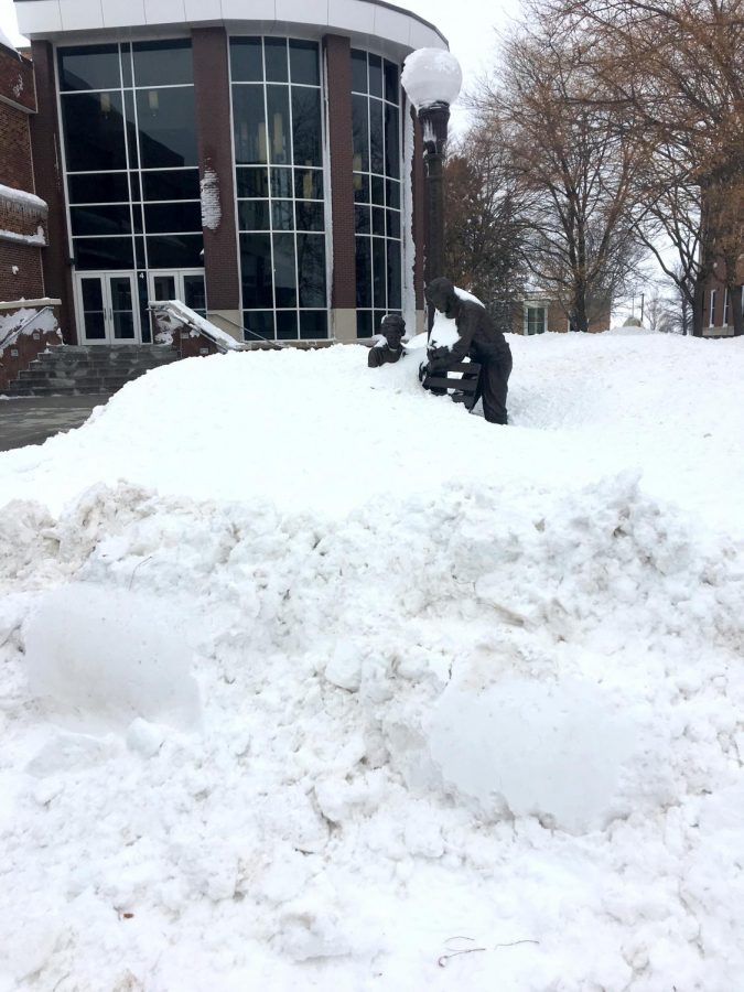 Snow piled high covering bikes and statues across campus. It took WSC several days to clear snow
off campus. Wayne received over 13 inches of snow in the snow storm on Jan. 22. 