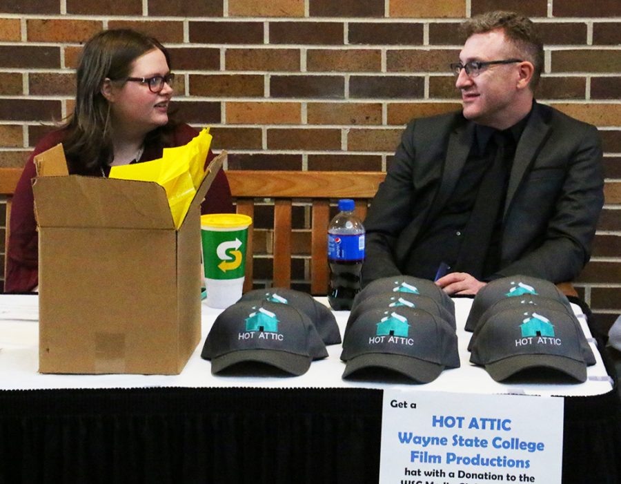 Natasha White and communication arts professor Michael White
promoted WSC’s film and TV studio by selling director-style hats that feature WSC’s Hot  Attic Productions logo at the Wildcat Spirit Film Festival on April 5.