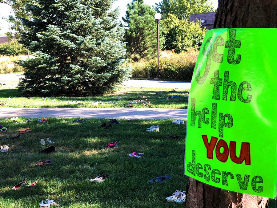 Active Minds put out shoes representing the 1,100 students
that commit suicide each year. This annual event helps raise
awareness for suicide prevention. 