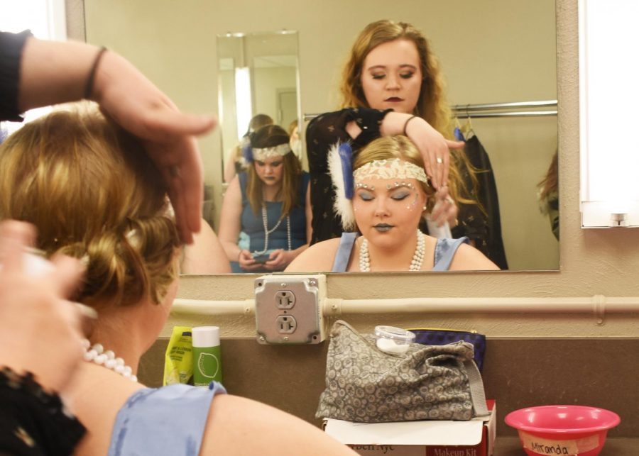 Members of the production of “A Midsummer Night’s Dream” prepare backstage prior to a performance of the play last week. Baxter was impressed with the detail of the production’s costuming.
