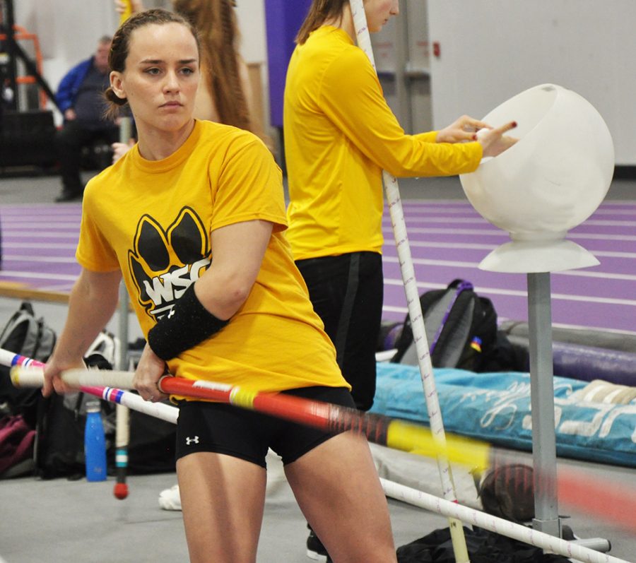 Mikayla Marvin prepares for a run through of pole vault.