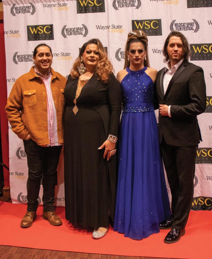 Cast members of The Queen of Pandoras Box on site for the premiere of the film. 

Left to right: Tia Pet, who played Jadore, Martina Shakers, who played Pandora, Chanelle Shakers, who played Scarlet, and Johnathan Cornish, who played Andrew.