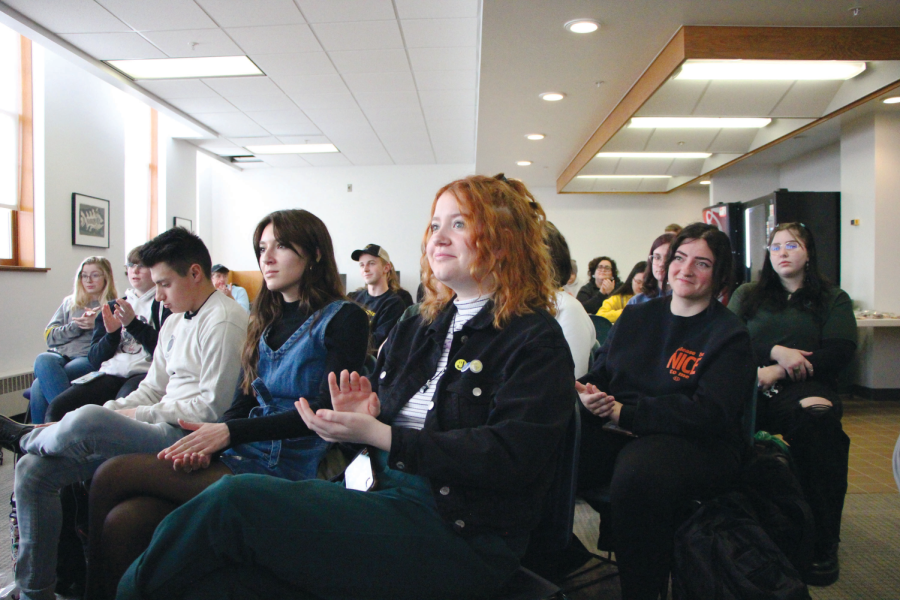 Students and other people from around the community gather and listen to guest speakers Kassandra Montag and Lucy Adkins perform their poetry on March 3rd for the Plains Writers Series. 