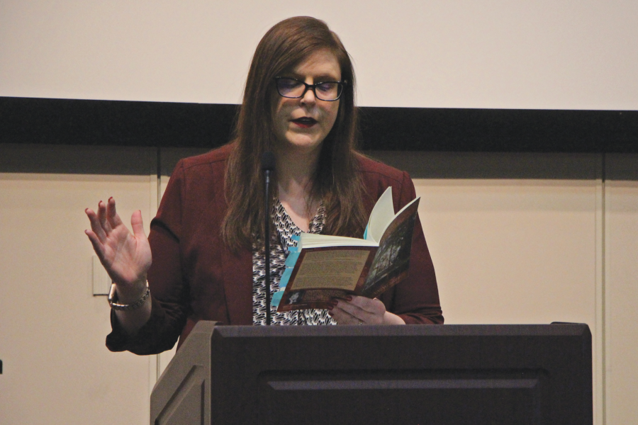 6.	Dr. Henning reads from her newly published poetry collection Terra Incognita during her Poetry Workshop. 