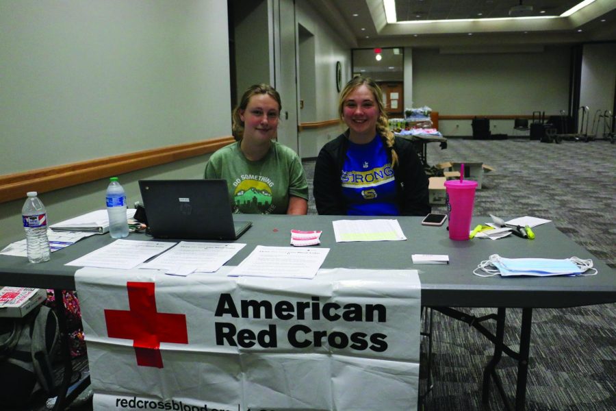 Red Cross Club with President Allie Jaixen on the right and volunteer Chloe Hibler on the left.