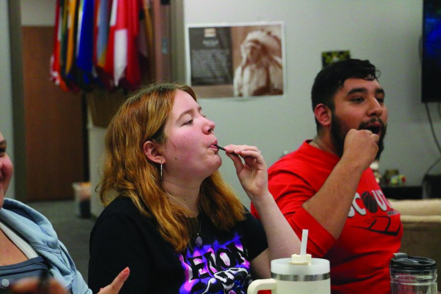 WSC students gather and play the card game “Truth or Dab” with hot sauce and chicken wings on Wednesday, Nov. 9.  