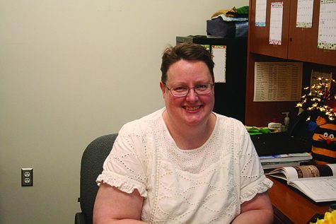 Jenifer Poulsen, assistant professor of family and consumer sciences, is pictured in her office in Benthack Hall.