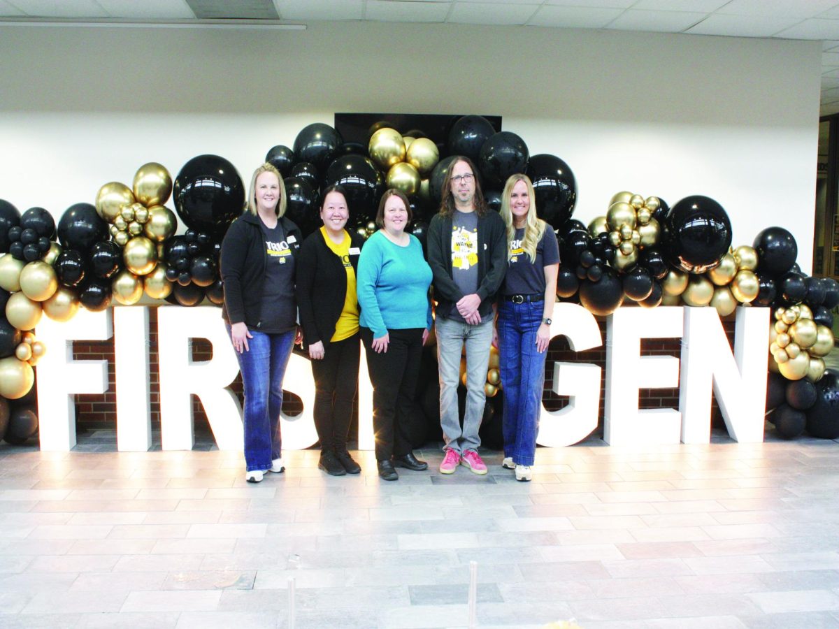 WSC TRIO staff pose for a photo. Pictured left to right: Jodene Cantrell, Nalee Moua, Gloria Kuhlmeyer, Vito Cole, and Liesel Powicki. Photo by Kaitlyn Bengston.