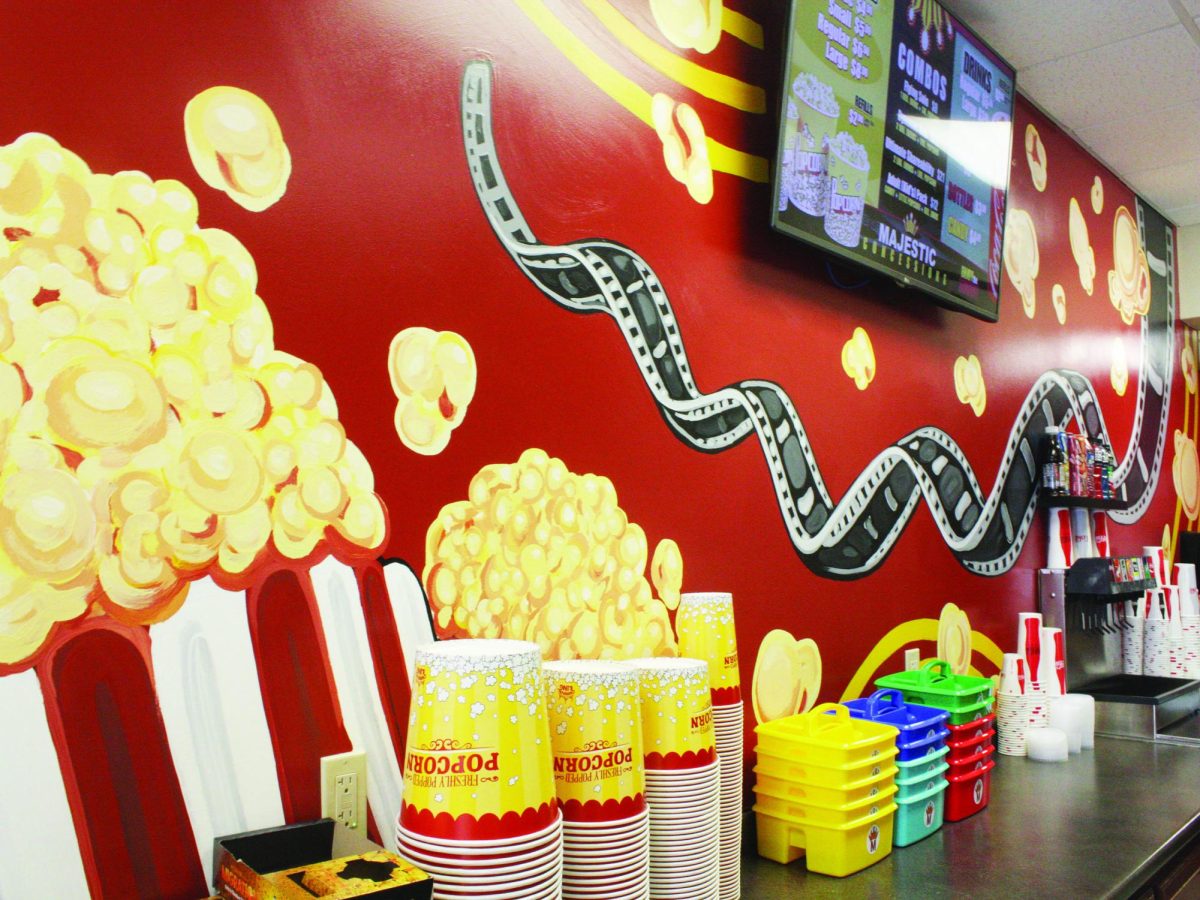 A new mural is displayed on the wall of the concessions stand at the Majestic Theater. Photo by Kaitlyn Bengtson.