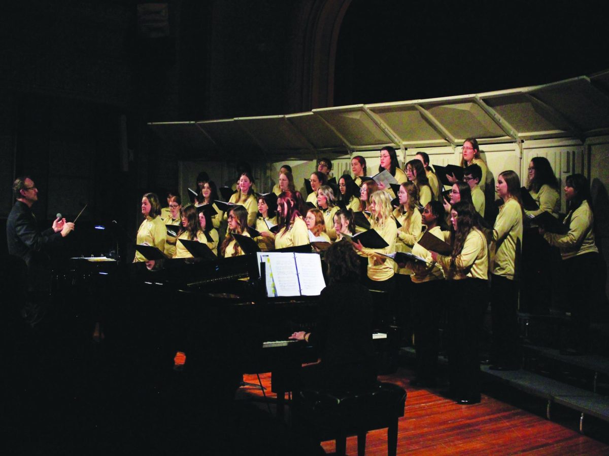 WSC choral conductor Matthew Armstrong conducts the choir.