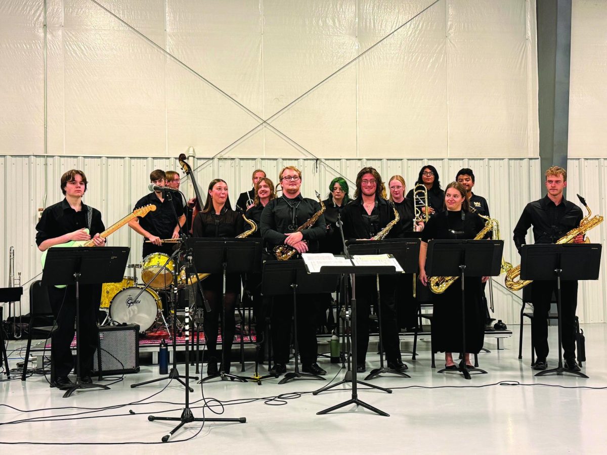 WSC jazz band stands for applause after performing at an event at the Wayne Municipal Airport. 
