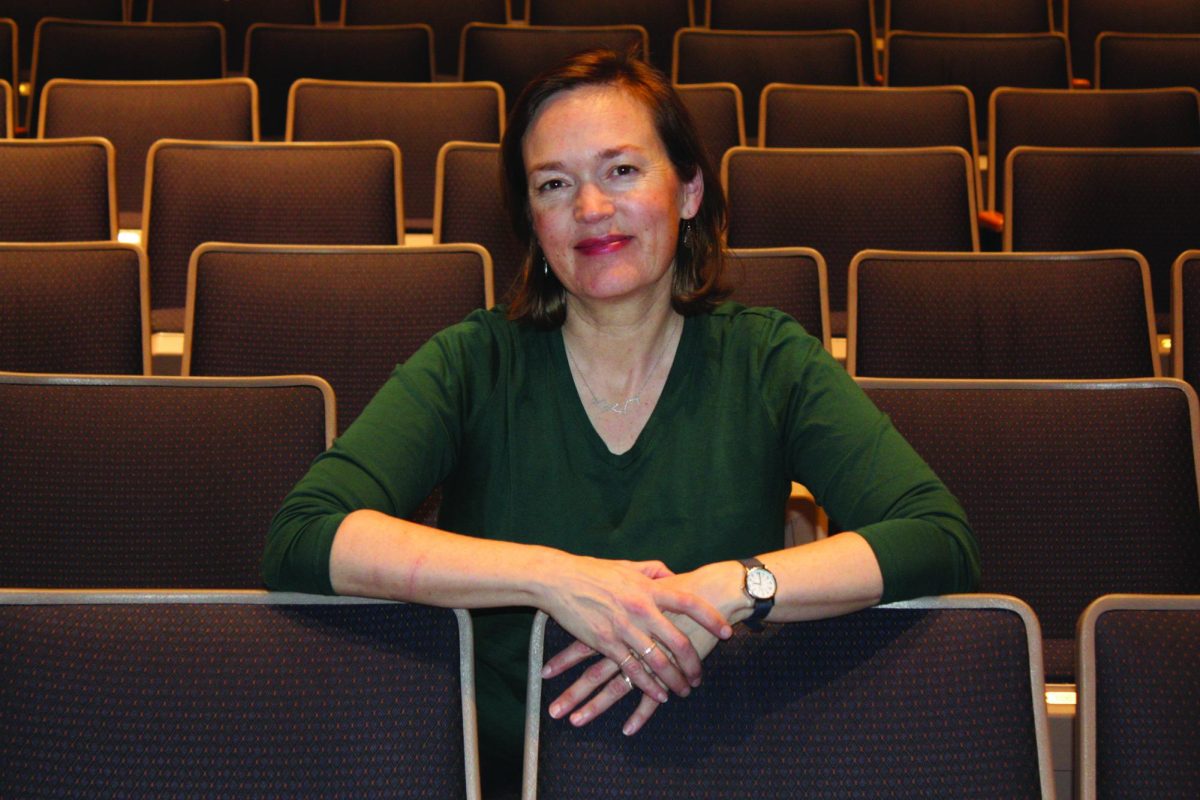 Mollie Young poses for a photo in Ramsey Theatre.